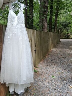 Wedding Gown- Features lace appliqué bodice